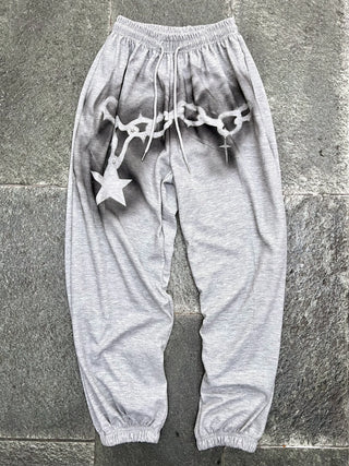 チェーンスプレープリントスウェットパンツ