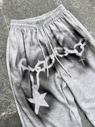 チェーンスプレープリントスウェットパンツ